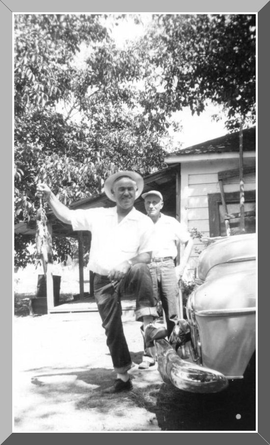 Oscar Conley with a stringer of trout